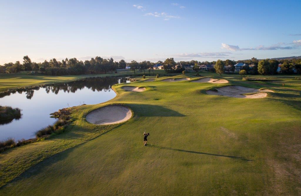 Man playing golf at sunset at Perth's best public golf course, The Vines Resort